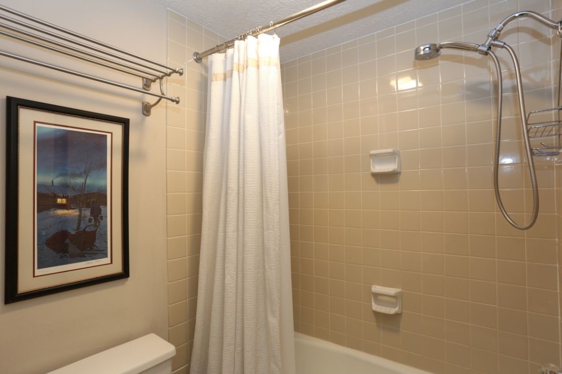 21680 Highway 6, Unit 2058 Keystone, CO 80435 - Photo 22 of 33 a bathroom with a shower