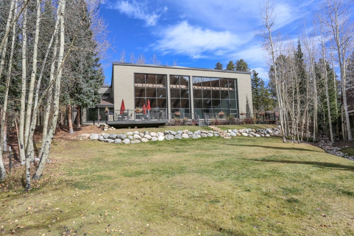 21680 Highway 6, Unit 2058 Keystone, CO 80435 - Photo 28 of 33 a front view of a house with a yard and sitting space
