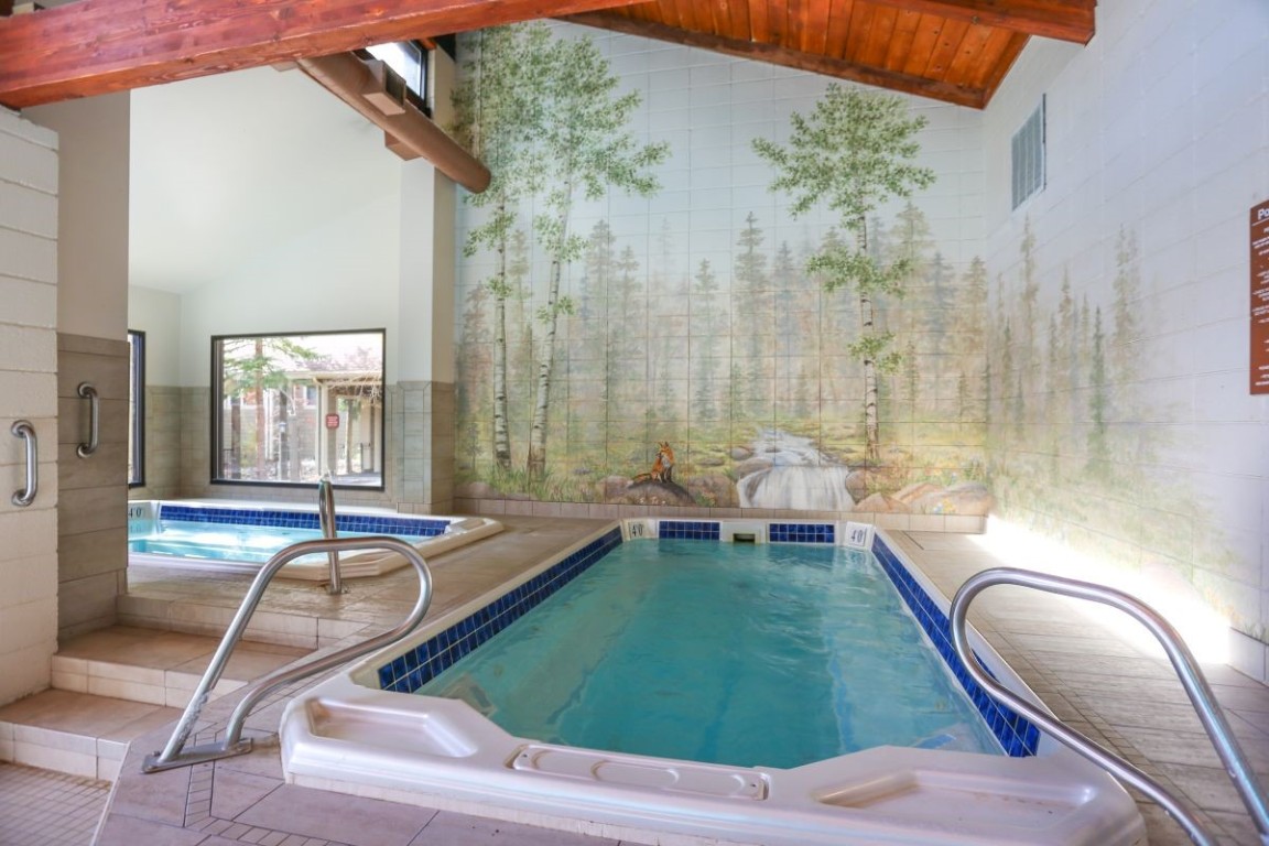 21680 Highway 6, Unit 2058 Keystone, CO 80435 - Photo 31 of 33 a room with pool table and windows