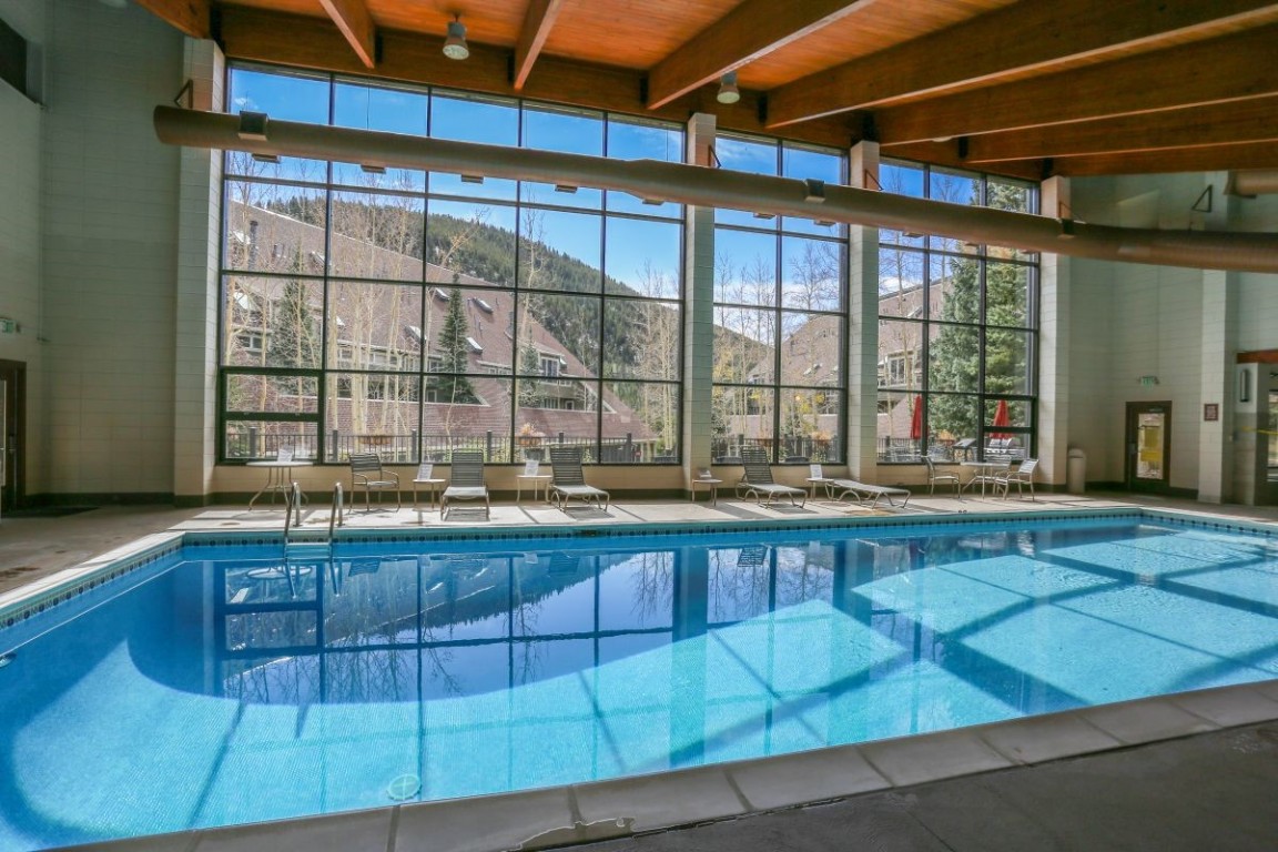 21680 Highway 6, Unit 2058 Keystone, CO 80435 - Photo 32 of 33 a swimming pool with outdoor seating