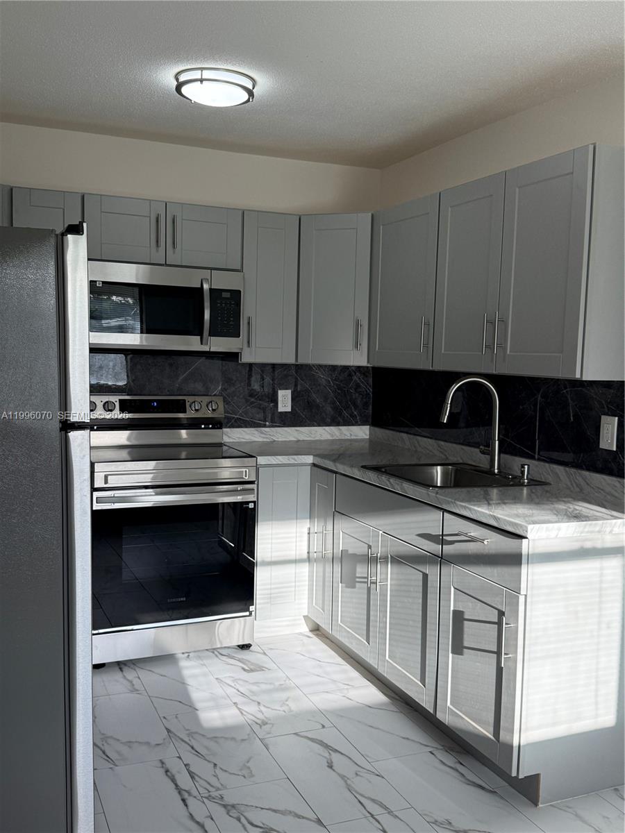 6071 Southwest 33rd Street, Unit 4 Miramar, FL 33023 - Photo 1 of 20