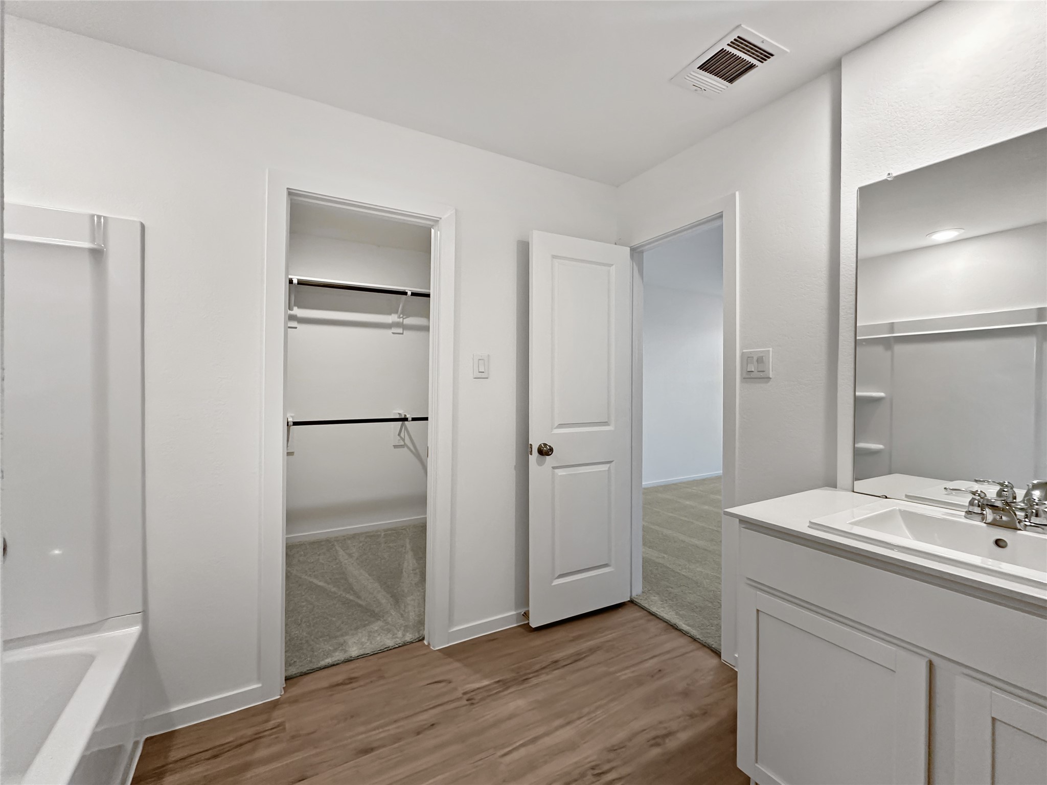 1715 Windrose Bend Angleton, TX 77515 - Photo 10 of 26 a bathroom with a sink and a mirror