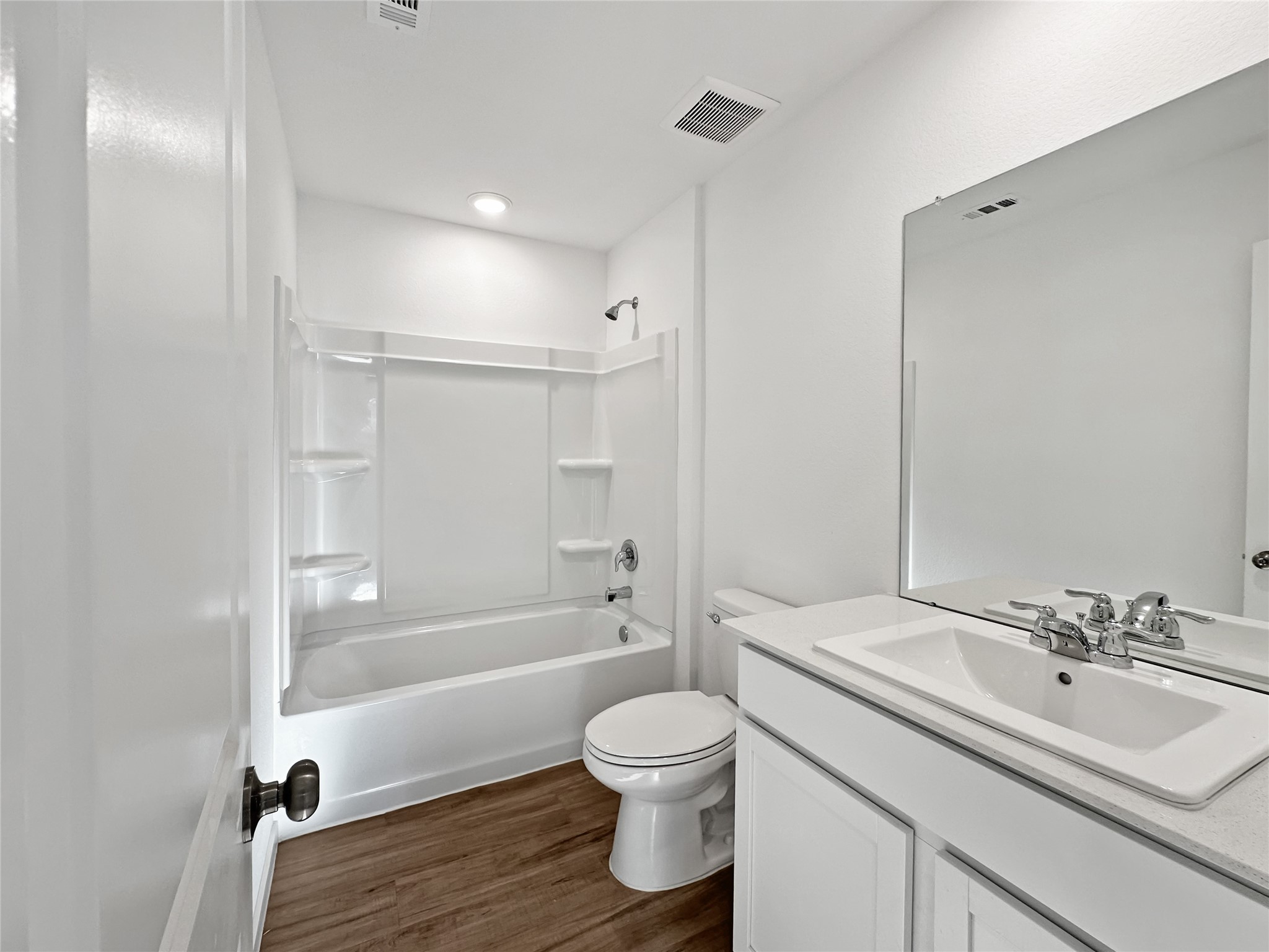 1715 Windrose Bend Angleton, TX 77515 - Photo 16 of 26 a bathroom with a sink toilet tub and shower