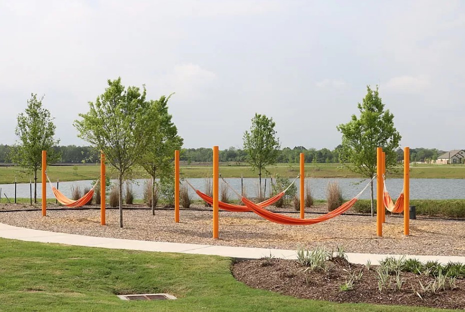 1715 Windrose Bend Angleton, TX 77515 - Photo 24 of 26 a view of a park with swings
