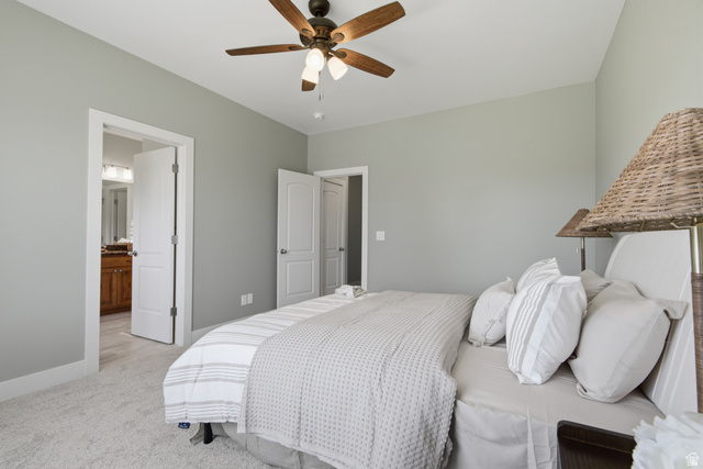1252 Skyline Road Saratoga Springs, UT 84045 - Photo 19 of 51 Neutral-toned room with a ceiling fan, light gray wall paint, white trim, and light-colored carpet flooring