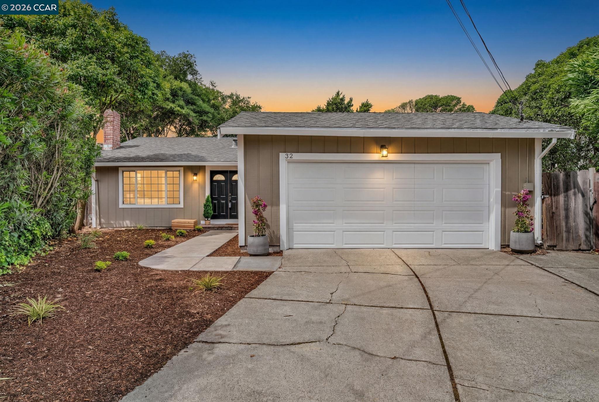 32 Yale Court San Ramon, CA 94583 - Photo 1 of 1 a front view of a house with a yard and garage