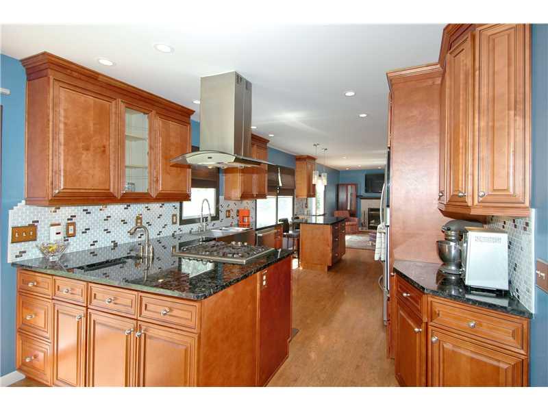 9275 North Florence Road Pittsburgh, PA 15237 - Photo 7 of 21 Kitchen. Another view of this beautiful kitchen which features granite countertops, stainless steel appliances and a stylish glass backsplash!