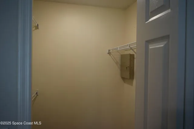 a white toilet sitting next to a bath tub