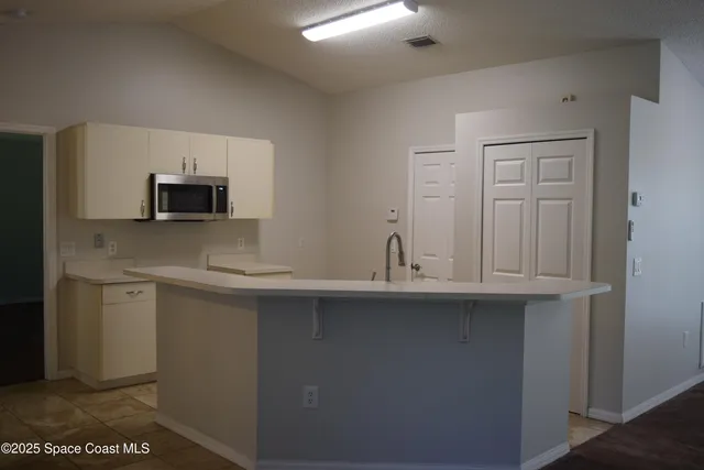 a view of a livingroom with a fireplace