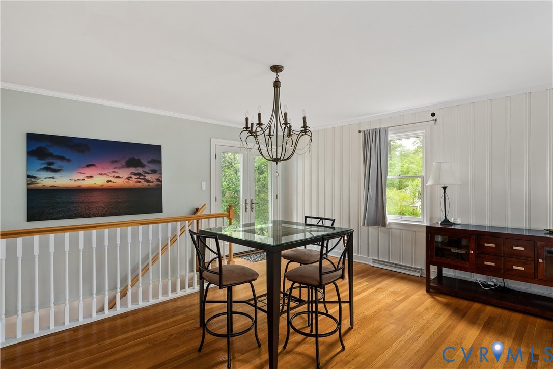 5414 New Kent Road Richmond, VA 23225 - Photo 18 of 62 a view of a dining room with furniture window and wooden floor