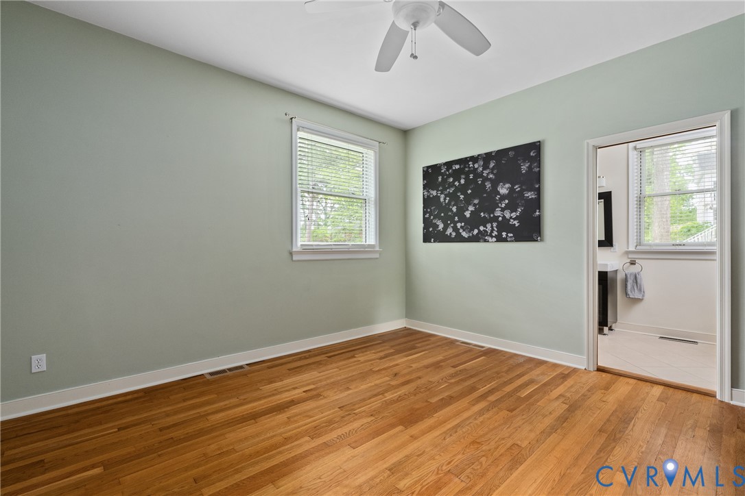 5414 New Kent Road Richmond, VA 23225 - Photo 24 of 62 a view of empty room with wooden floor and fan
