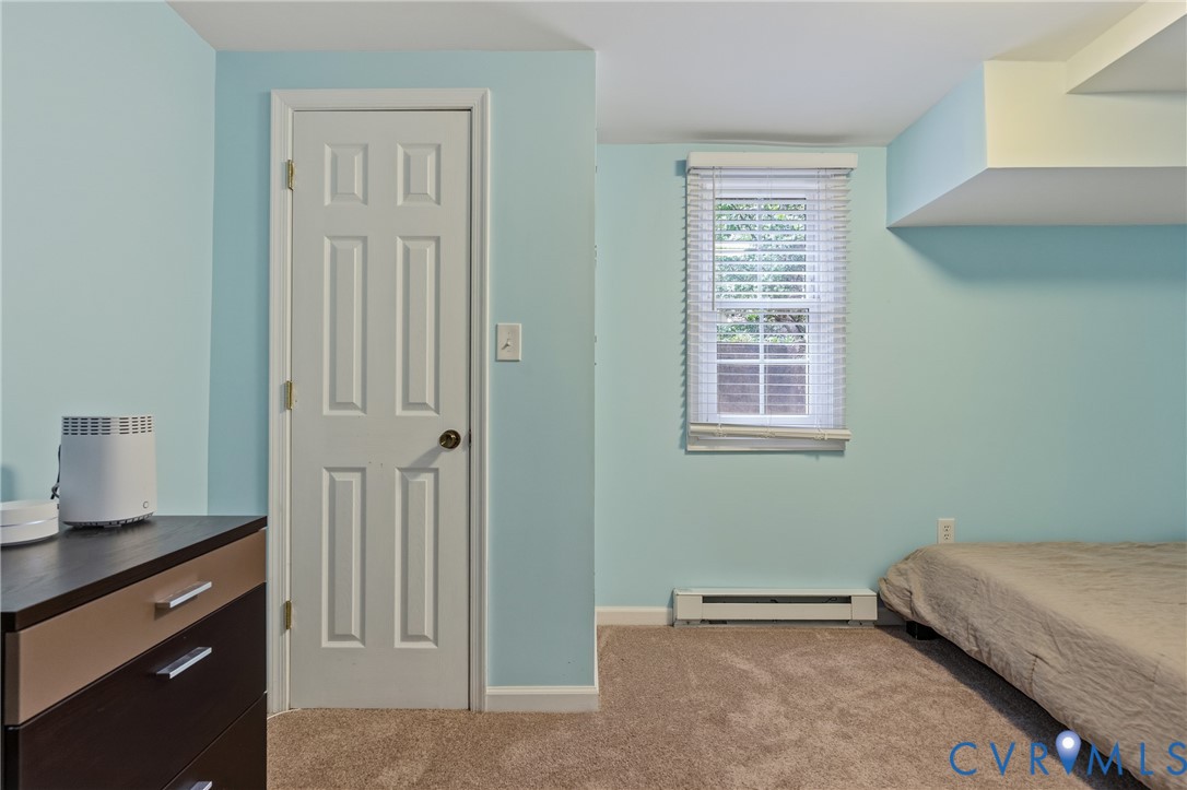 5414 New Kent Road Richmond, VA 23225 - Photo 42 of 62 a bedroom with a bed and a window