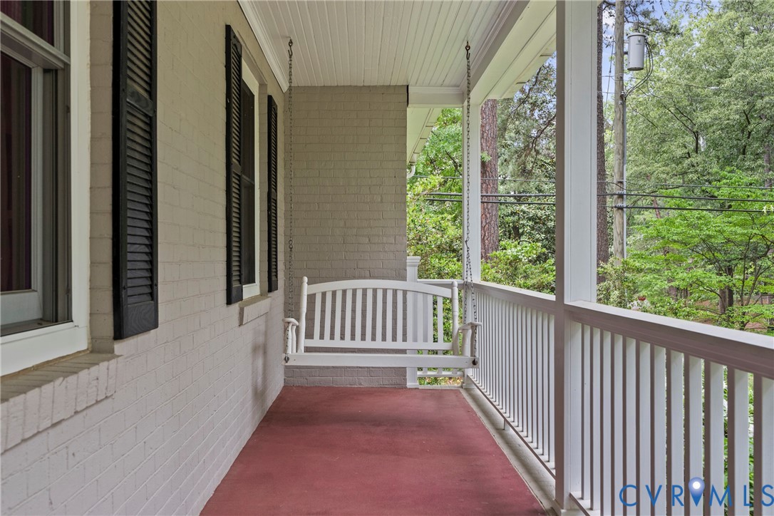 5414 New Kent Road Richmond, VA 23225 - Photo 56 of 62 a view of a porch with wooden floor and stairs