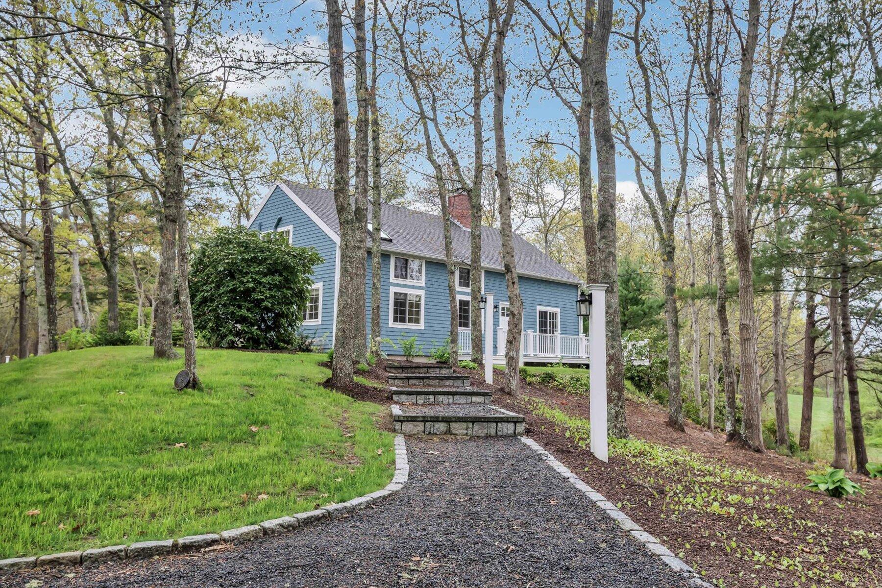 15 Greensward Road Mashpee, MA 02649 - Photo 1 of 27 a view of a house with a yard