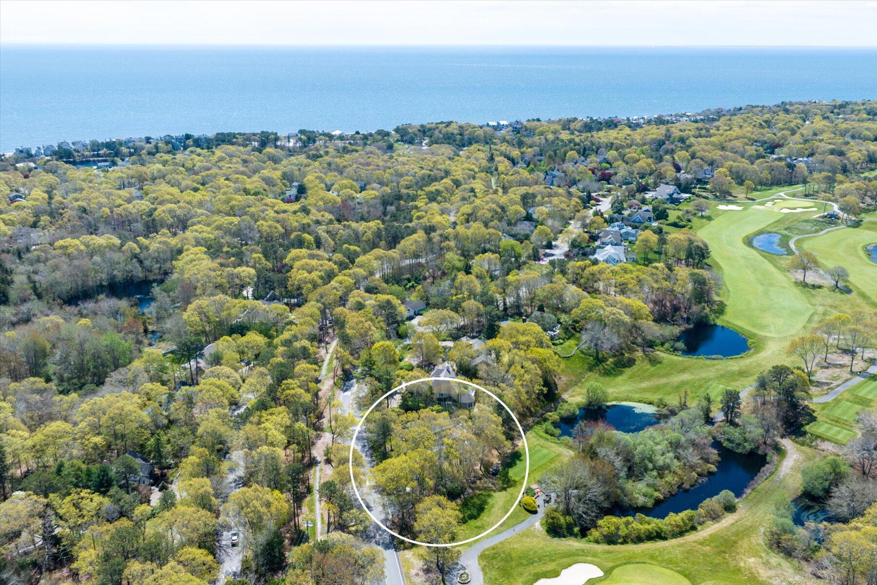 15 Greensward Road Mashpee, MA 02649 - Photo 3 of 27 a view of a city with ocean