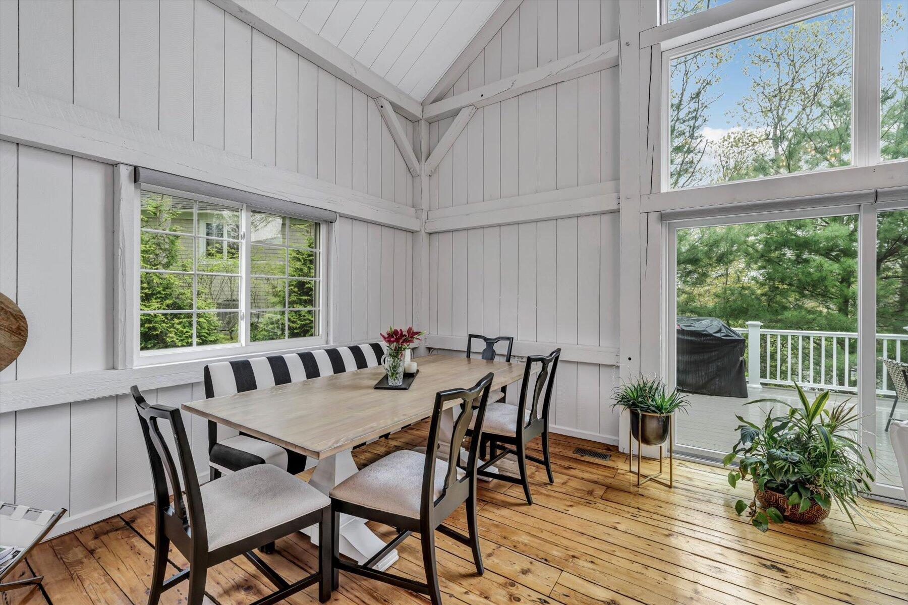 15 Greensward Road Mashpee, MA 02649 - Photo 7 of 27 a view of a dining room with furniture window and wooden floor