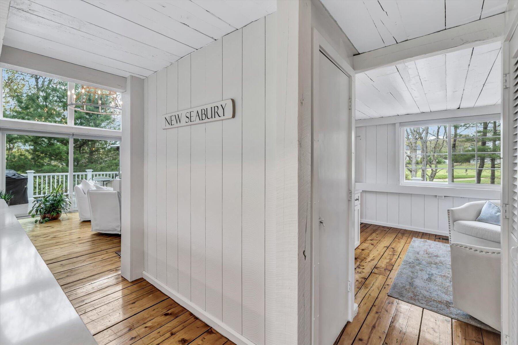 15 Greensward Road Mashpee, MA 02649 - Photo 10 of 27 a view of a bedroom with wooden floor and windows