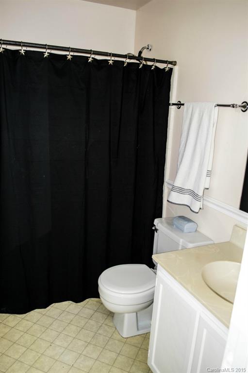 8710 Houston Ridge Road, Unit 21 Charlotte, NC 28277 - Photo 13 of 22 a bathroom with a sink and a toilet