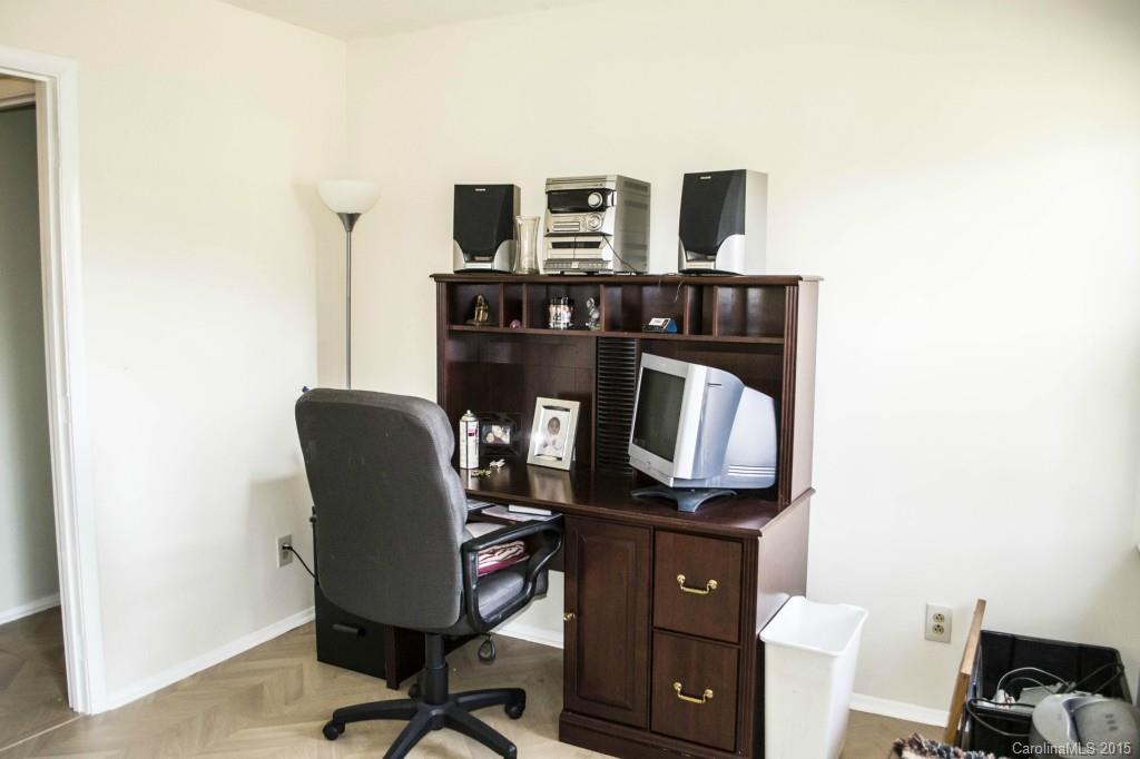 8710 Houston Ridge Road, Unit 21 Charlotte, NC 28277 - Photo 16 of 22 a living room with furniture and a flat screen tv
