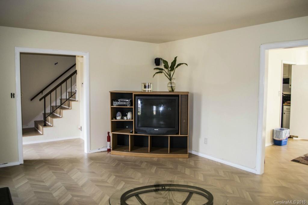 8710 Houston Ridge Road, Unit 21 Charlotte, NC 28277 - Photo 5 of 22 a view of a hallway with wooden floor and entryway