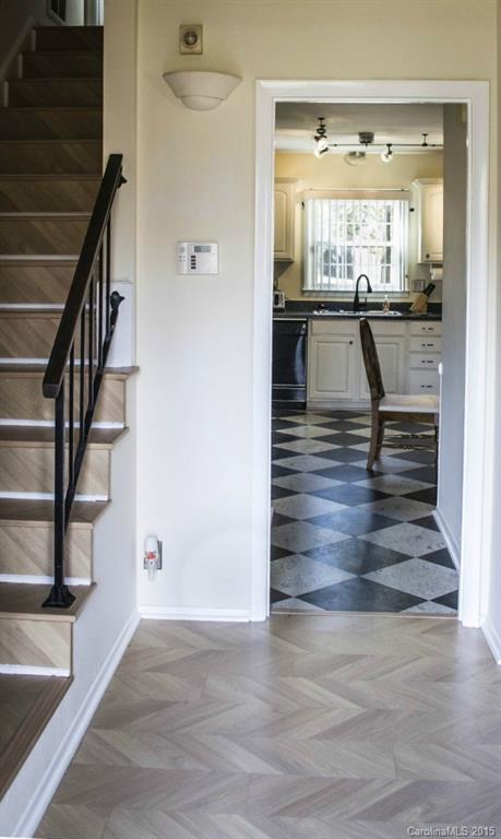 8710 Houston Ridge Road, Unit 21 Charlotte, NC 28277 - Photo 6 of 22 a view of entryway and hall with wooden floor