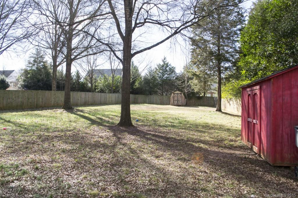 8710 Houston Ridge Road, Unit 21 Charlotte, NC 28277 - Photo 10 of 22 a view of backyard with tree