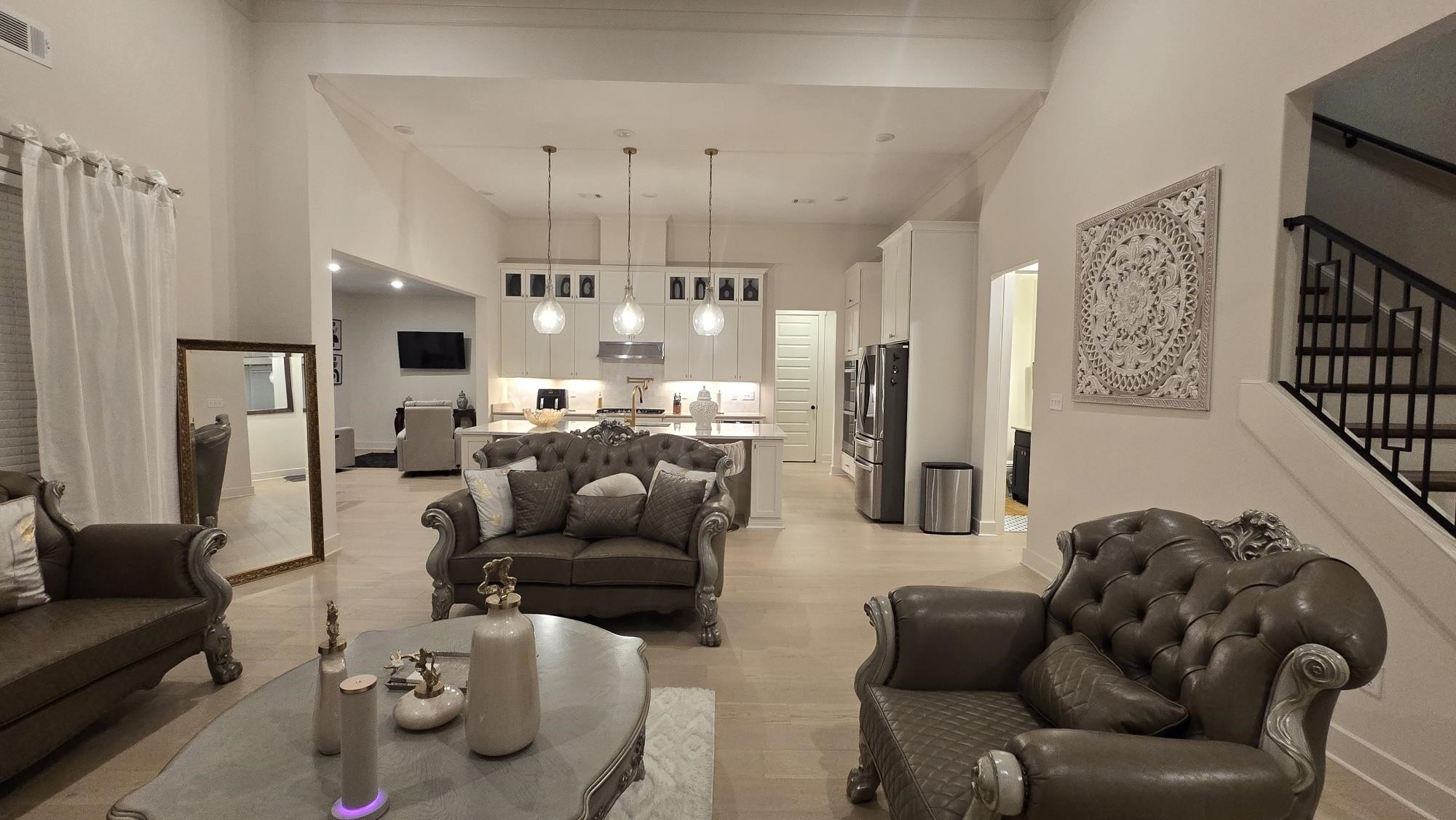 11200 Shelby Post Road Collierville, TN 38017 - Photo 12 of 29 a living room with furniture kitchen view and a chandelier