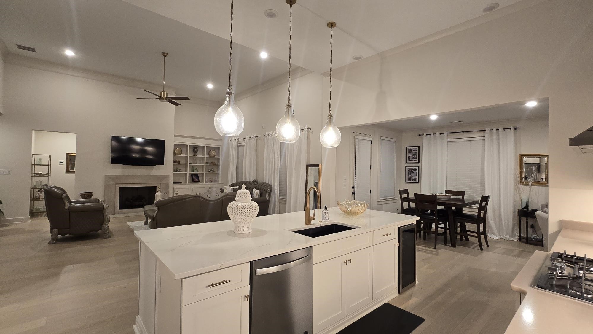 11200 Shelby Post Road Collierville, TN 38017 - Photo 13 of 29 a large kitchen with a counter space a sink appliances and living room view