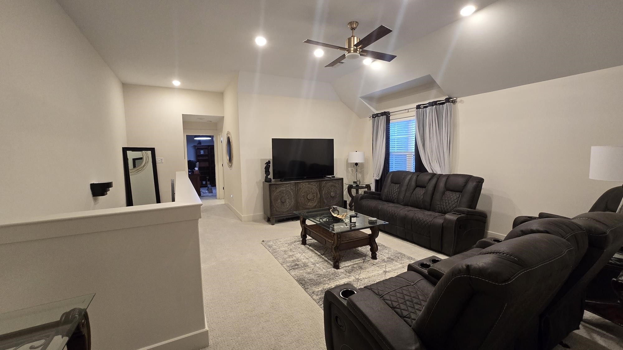 11200 Shelby Post Road Collierville, TN 38017 - Photo 19 of 29 a living room with furniture and a flat screen tv