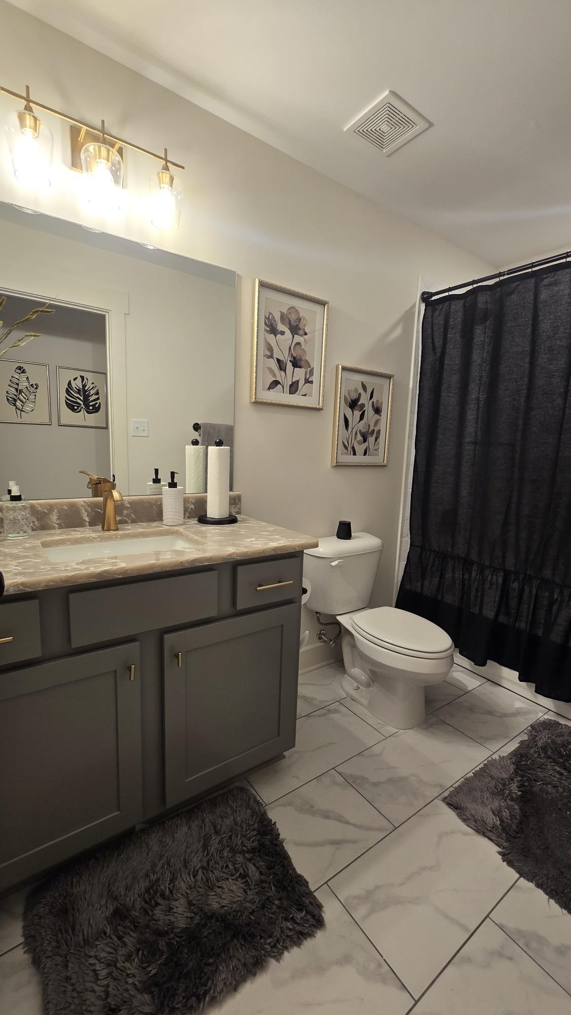 11200 Shelby Post Road Collierville, TN 38017 - Photo 26 of 29 a bathroom with a sink toilet and a mirror