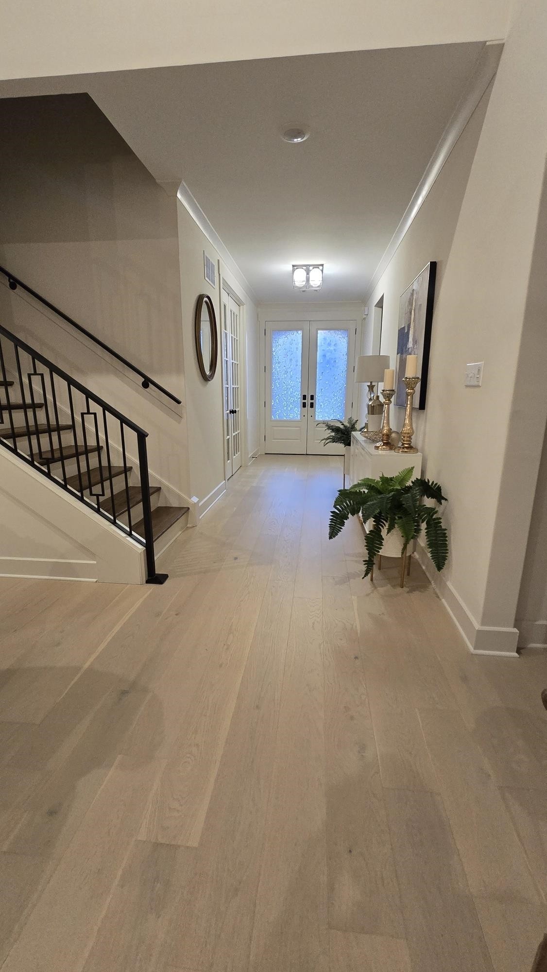 11200 Shelby Post Road Collierville, TN 38017 - Photo 10 of 29 a living room with lots of furniture and a chandelier