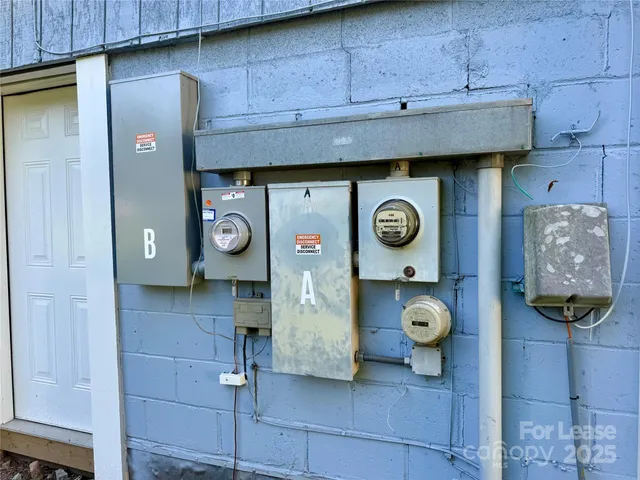 a kitchen with a white cabinets and white appliances