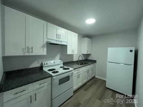 1902 West 5th Avenue, Unit B Gastonia, NC 28052 - Photo 23 of 25 a kitchen with granite countertop a sink stove and refrigerator