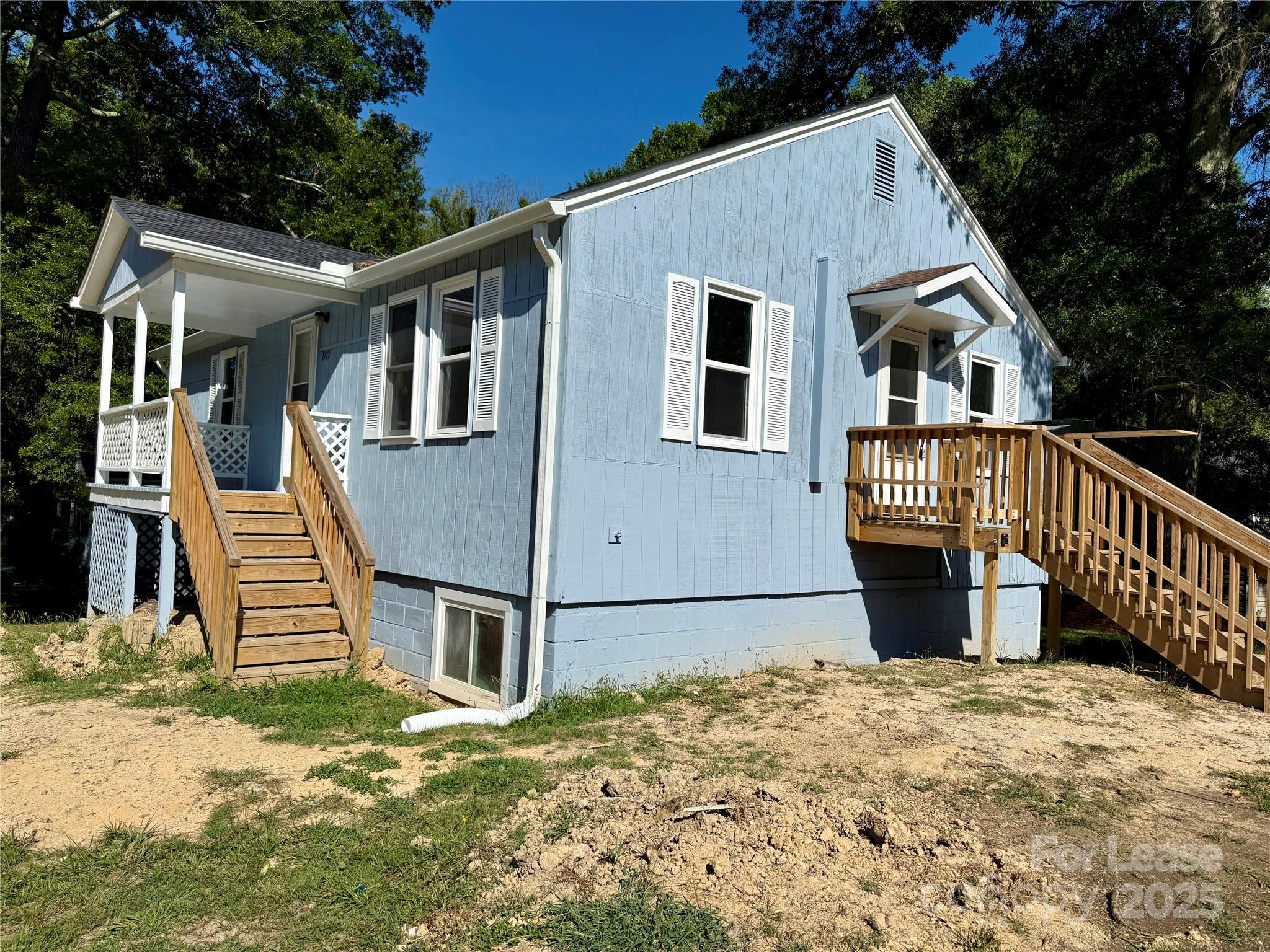 1902 West 5th Avenue, Unit B Gastonia, NC 28052 - Photo 3 of 25 a front view of a house with a yard