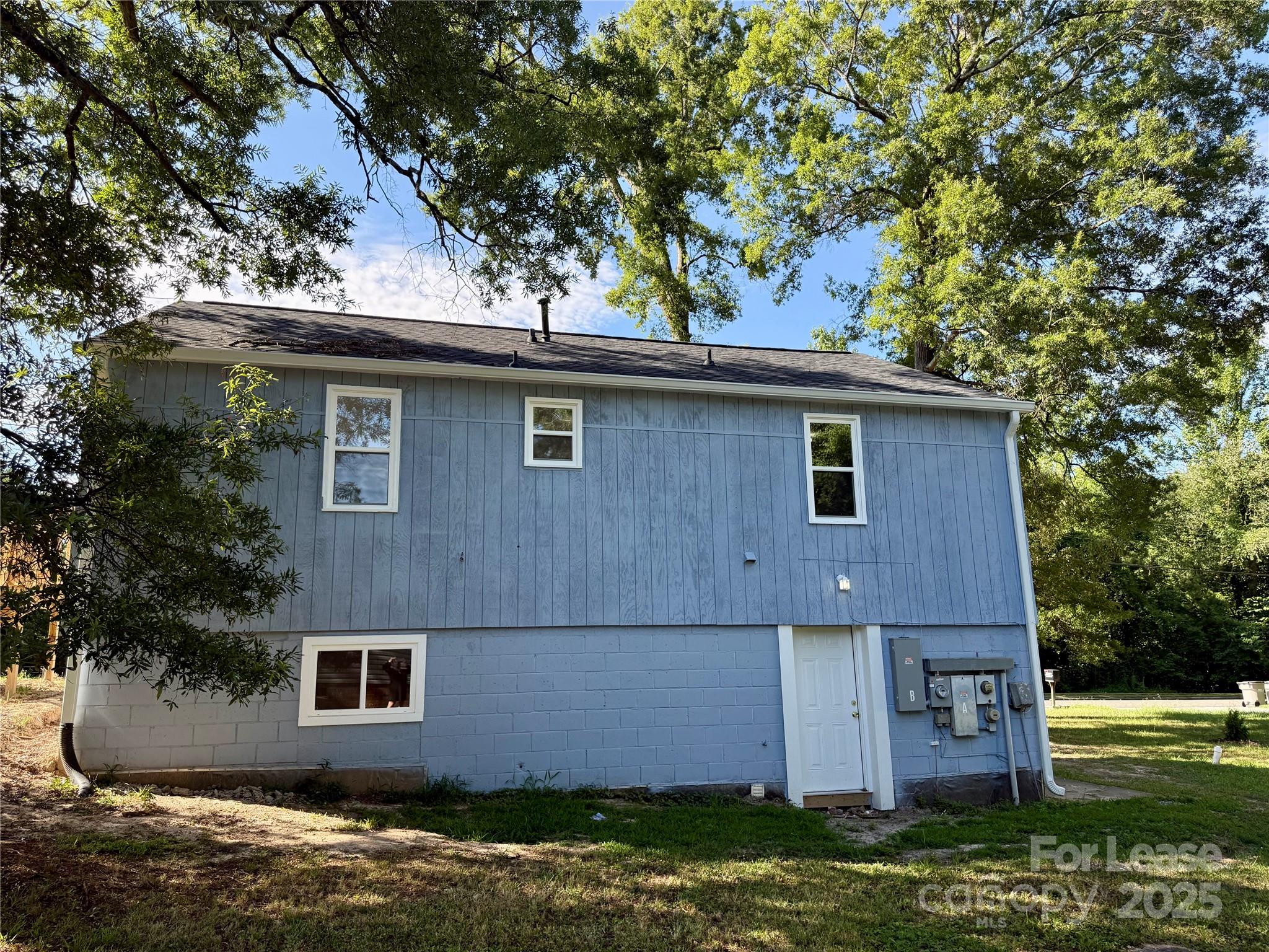 1902 West 5th Avenue, Unit B Gastonia, NC 28052 - Photo 6 of 25 a front view of a house with garden