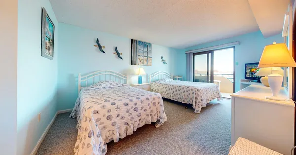 a room with furniture and a large window