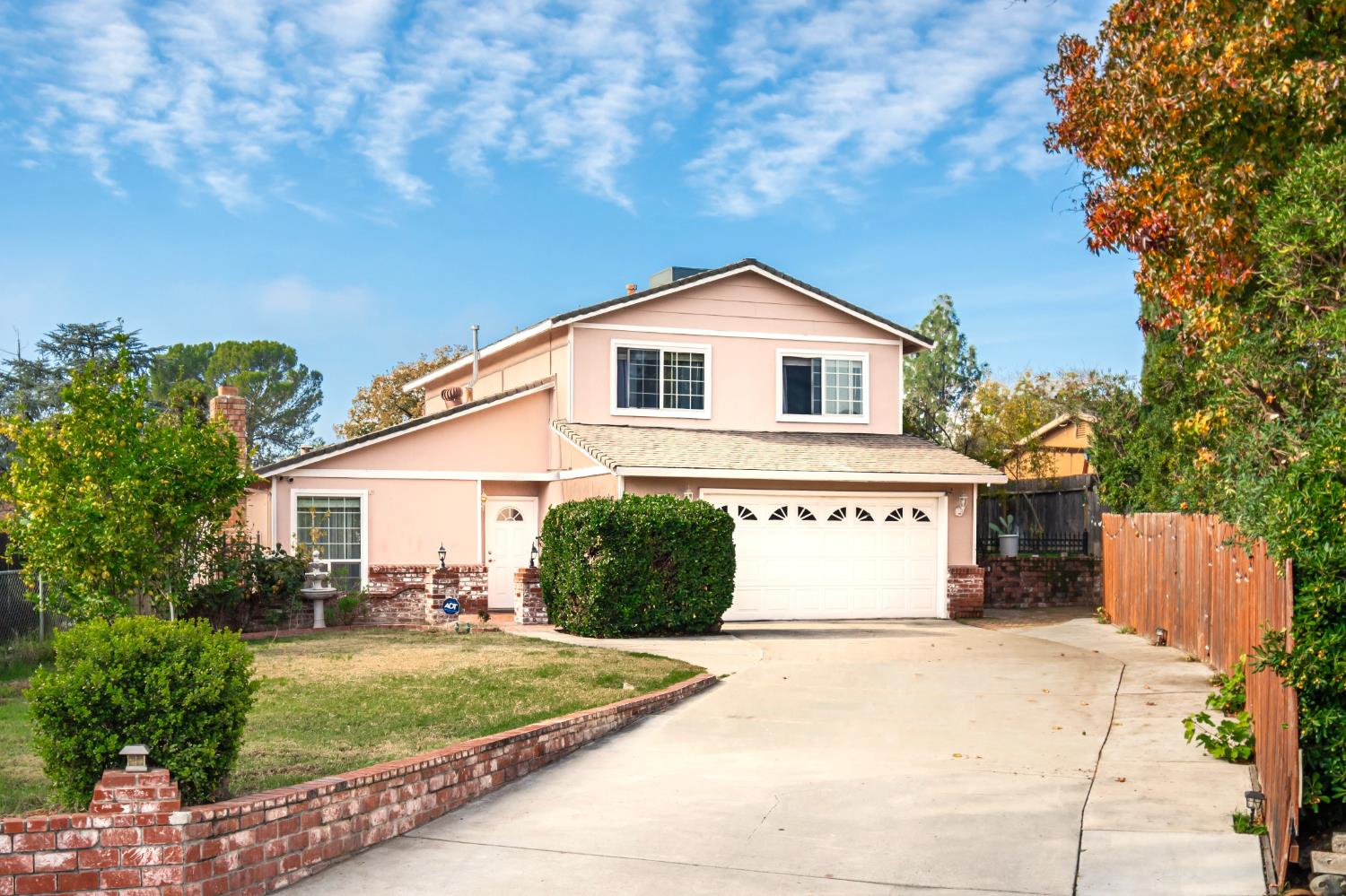 6851 Aleta Way Sacramento, CA 95842 - Photo 1 of 45 a front view of a house with a yard and garage