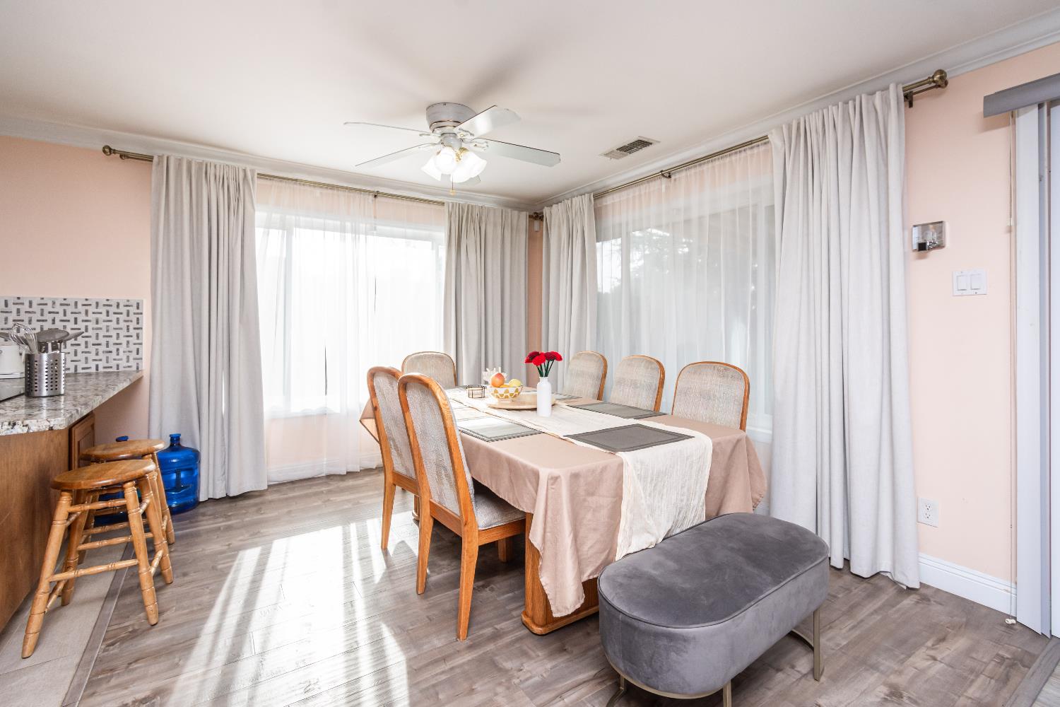 6851 Aleta Way Sacramento, CA 95842 - Photo 17 of 45 a view of a dining room with furniture window and wooden floor