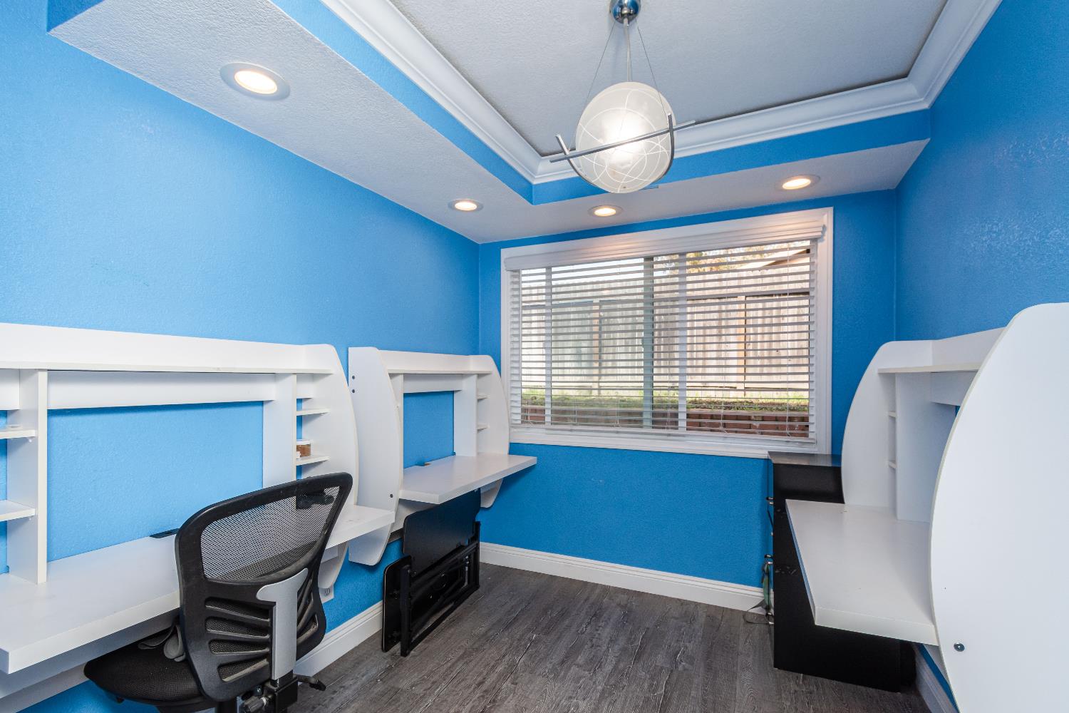 6851 Aleta Way Sacramento, CA 95842 - Photo 23 of 45 a bedroom with furniture and a window