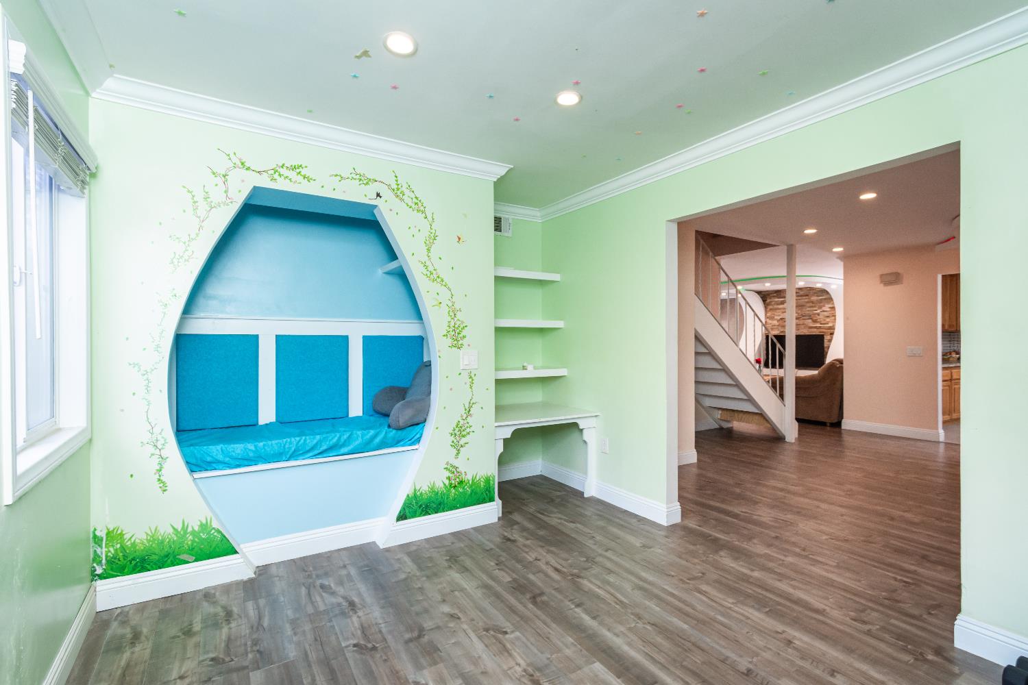 6851 Aleta Way Sacramento, CA 95842 - Photo 27 of 45 a view of a hallway view with wooden floor and staircase