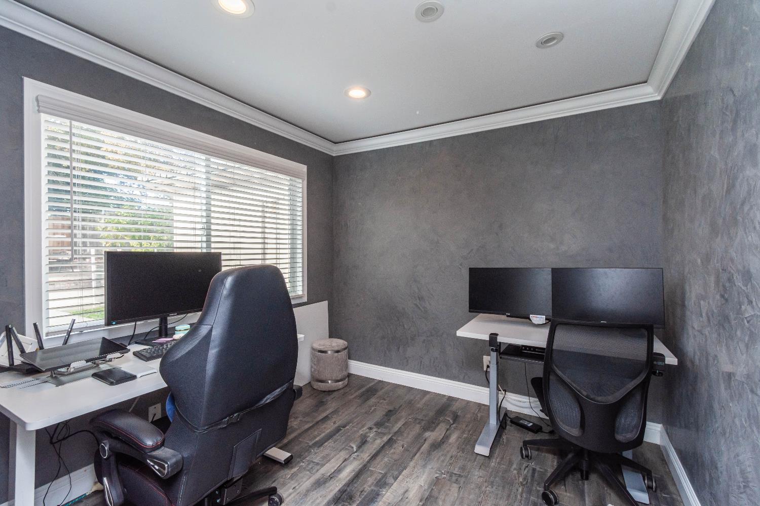 6851 Aleta Way Sacramento, CA 95842 - Photo 28 of 45 a view of a workspace with furniture and a window