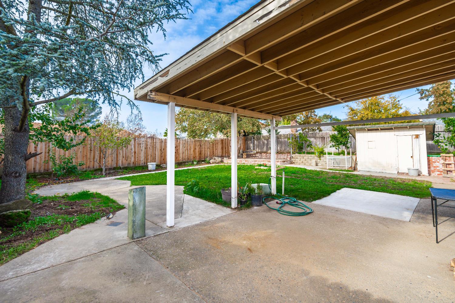 6851 Aleta Way Sacramento, CA 95842 - Photo 40 of 45 a view of backyard with green space
