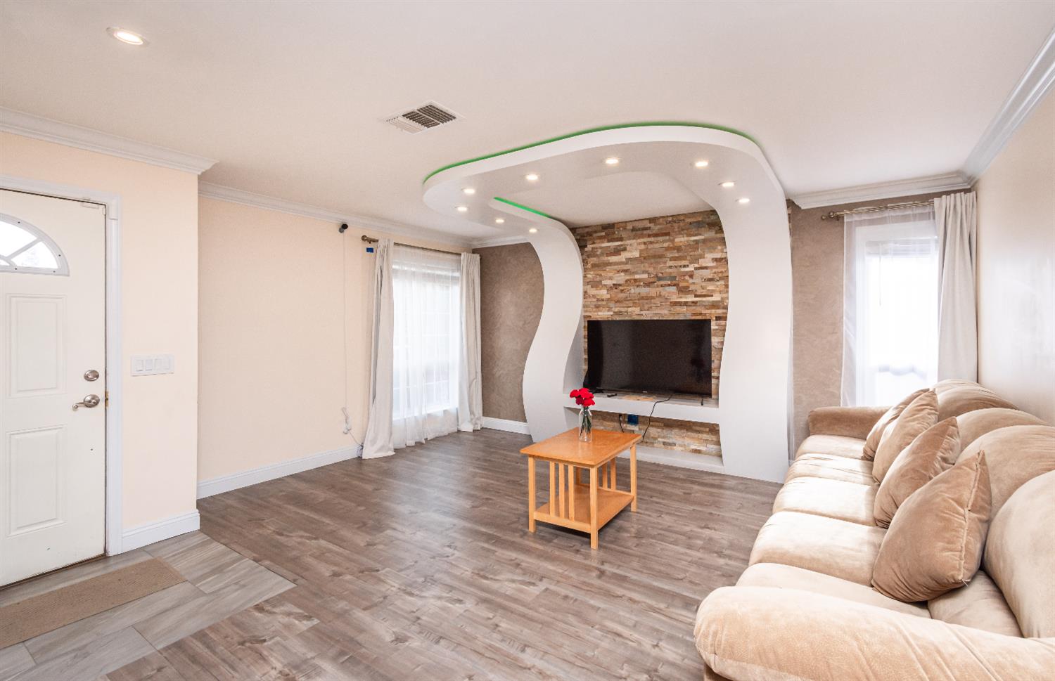 6851 Aleta Way Sacramento, CA 95842 - Photo 5 of 45 a living room with furniture and a flat screen tv