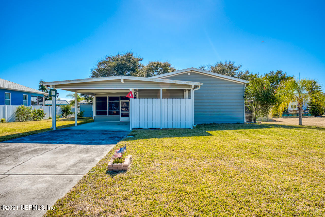 279 Pizarro Road St. Augustine, FL 32080 - Photo 1 of 34 a view of outdoor space yard and swimming pool
