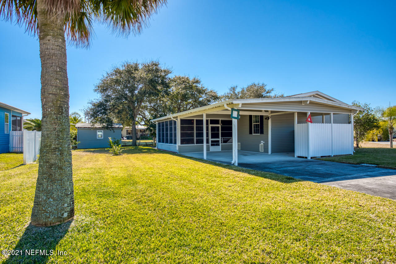 279 Pizarro Road St. Augustine, FL 32080 - Photo 3 of 34 a view of a house with a swimming pool