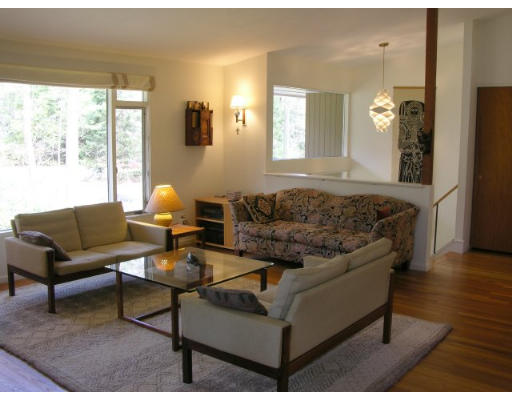 21 Turning Mill Road Lexington, MA 02420 - Photo 3 of 9 a living room with furniture and a large window