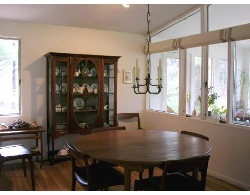 21 Turning Mill Road Lexington, MA 02420 - Photo 5 of 9 a dining room with table and chairs