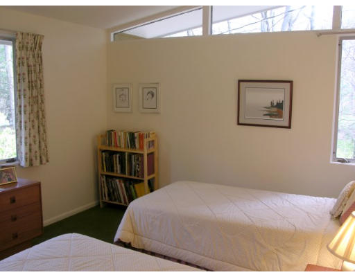 21 Turning Mill Road Lexington, MA 02420 - Photo 8 of 9 a bedroom with a bed and closet