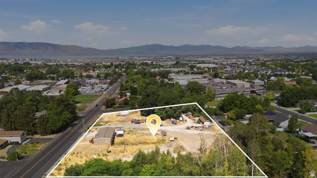 426 North Locust Avenue Lindon, UT 84042 - Photo 2 of 9 Aerial perspective showcasing a large parcel of land with a single-story structure