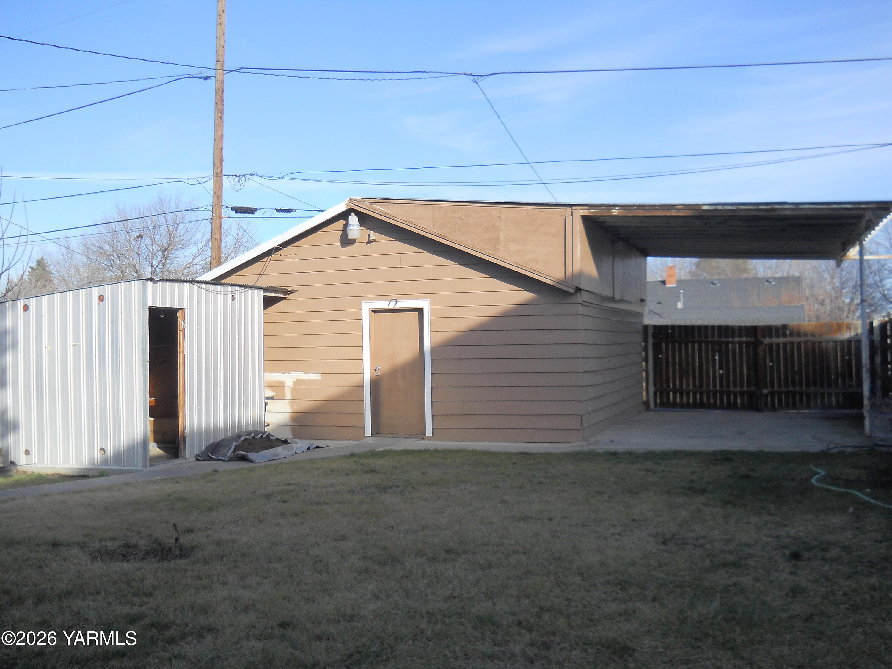303 Ave G Grandview, WA 98930 - Photo 21 of 23 a view of backyard of house